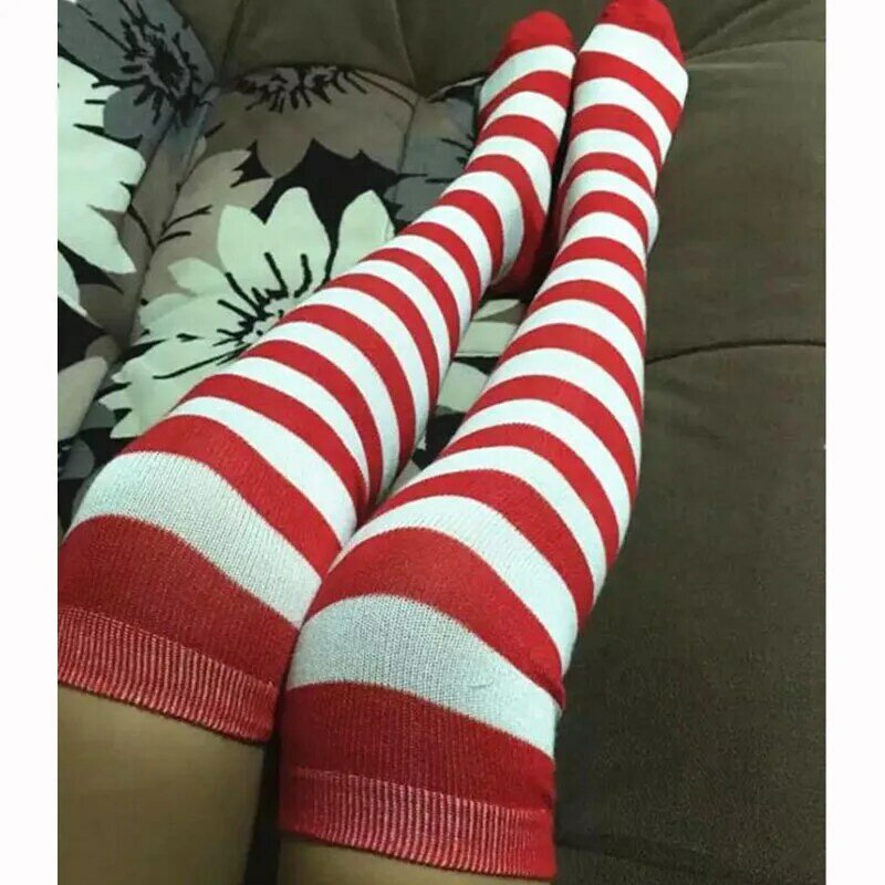 Shemales in striped christmas stockings