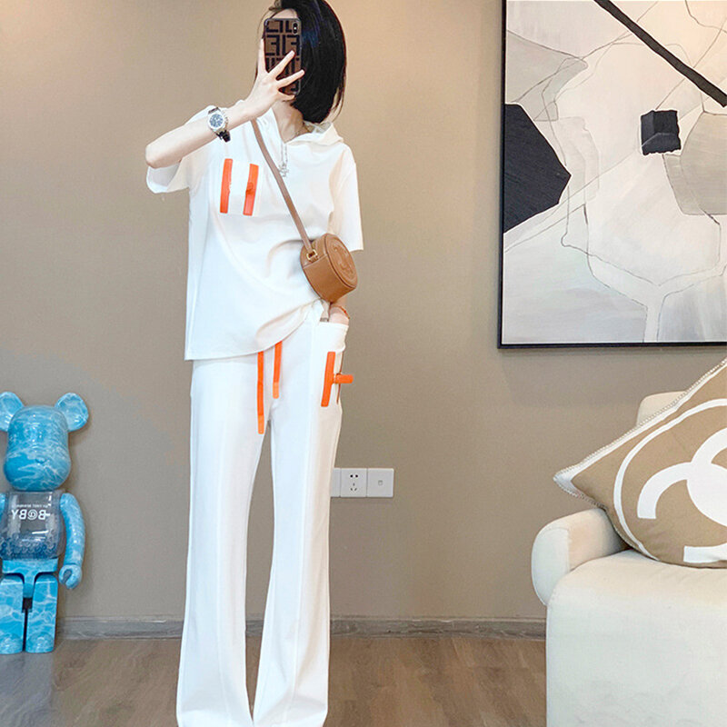 Luksusowy garnitur damski 2024 lato nowa moda sportowa dwuczęściowy zestaw białe spodnie z szerokimi nogawkami na co dzień szybkoschnący wysokiej jakości