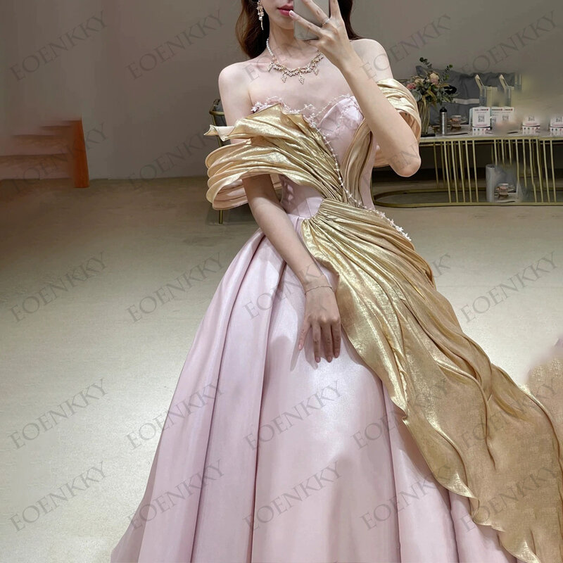 ピンクのファッショナブルなロングドレス,ウエディングドレス,裸の肩,地面の長さ,シックなウェディングドレス ピンクファッションロングストラップレスドレス  ストラップレスラインフォーマルイブニングドレス  床の長さのウェディングドレス