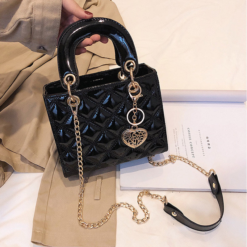 女性のための高級ブランドのハンドバッグ,ダイヤモンドとストライプのチェーンが付いたデザイナーのショルダーバッグ,高品質