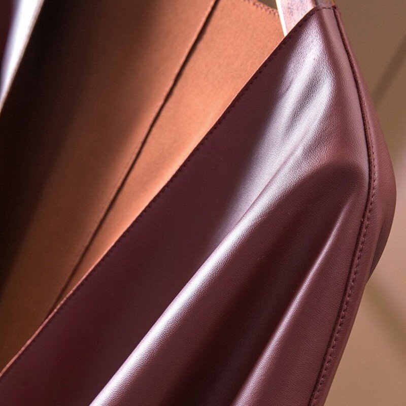 Chaqueta de cuero auténtico con cinturón y cuello en V profundo para mujer, abrigo elegante de lujo para oficina italiana, ceñido, a la moda
