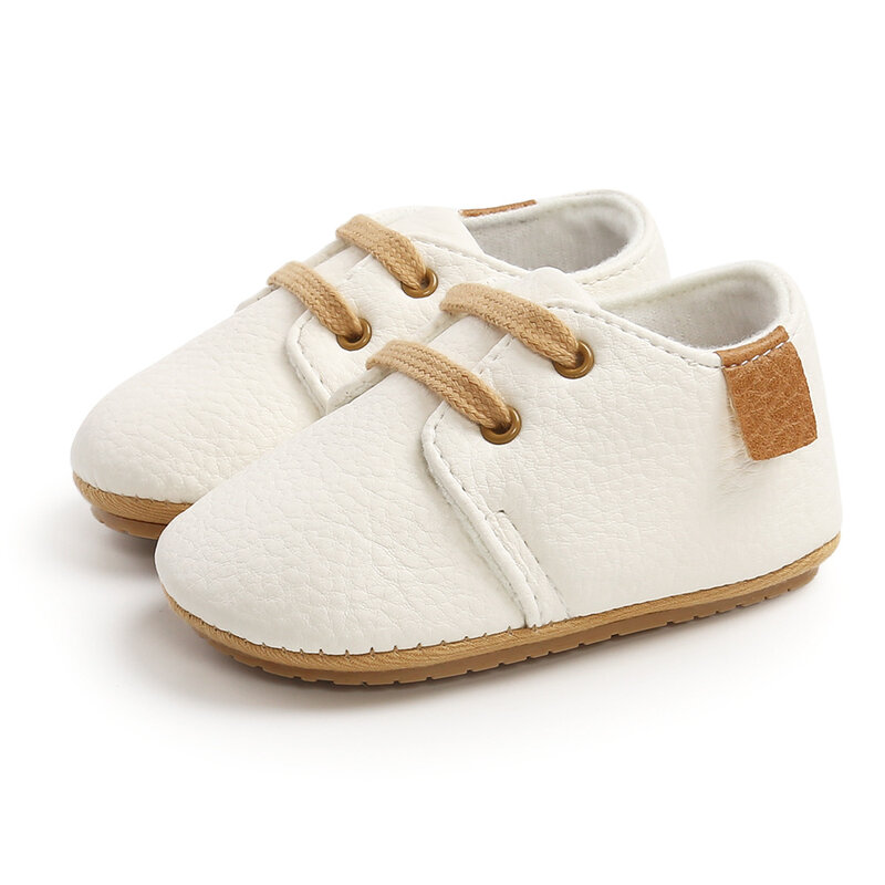 Zapatos Retro sencillos para bebé recién nacido, suela De goma De cuero De Color sólido, antideslizantes, planos, mocasines para niños pequeños