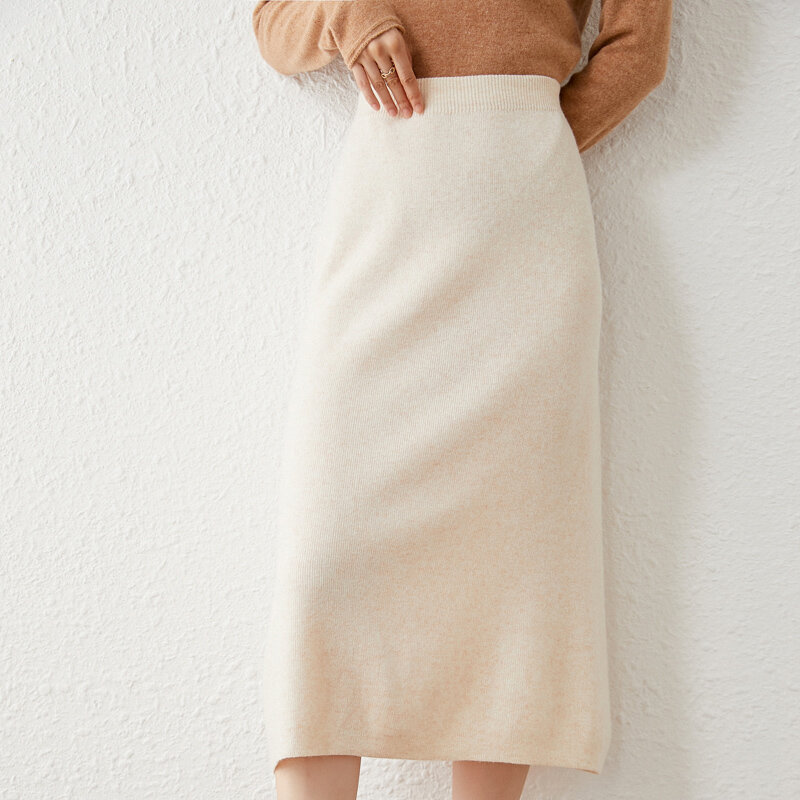 Saia feminina meados de comprimento seção 021 outono e inverno nova camisola de caxemira cor pura magro saco de lã hip tricô coreano moda