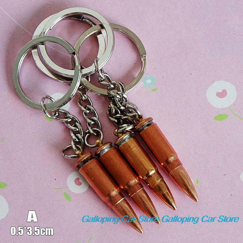 Llavero con forma de bala para hombre y mujer, accesorio para llaves de coche, cuchara para la oreja, accesorio para parejas