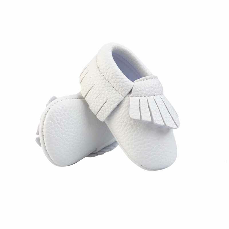 Mocasines de bebé hechos a mano suave inferior moda borlas bebés recién nacidos niñas zapatos 12 colores PU cuero niño niños Prewalkers botas