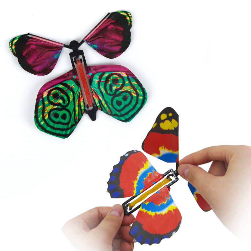 Juguete de truco de magia para fiesta, hada volando en el libro, banda de goma de mariposa alimentada, regalo sorpresa para niños, 10 piezas