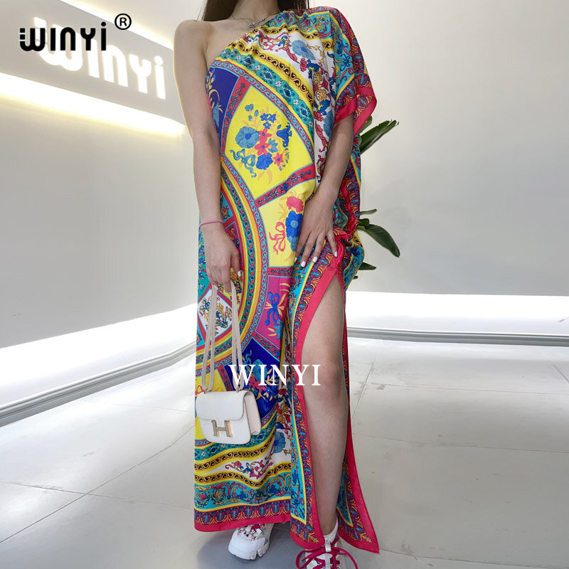 2021 WINYI 인쇄 된 여자의 복장 패션 디자인 대각선 어깨 루스 드레스 맥시 롱 드레스 여름 해변 파티 우아한 드레스