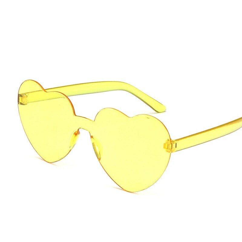 Spedizione gratuita 2023 occhiali da sole con personalità dell'oceano a forma di cuore color caramella