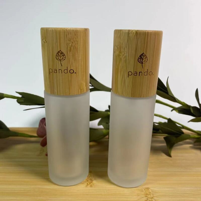 Atacado fosco de vidro claro garrafa de óleo do cabelo loção bomba soro recipiente conta-gotas de armazenamento viagem cuidados com a pele embalagem tampa de bambu