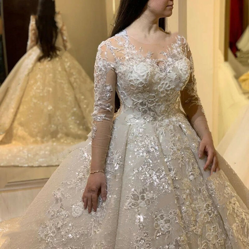 Arabskie koronkowe suknie ślubne Appliqued długie rękawy Ivory O Neck Bride suknie 2021 Marry Muslim Dubai Princess biała suknia ślubna
