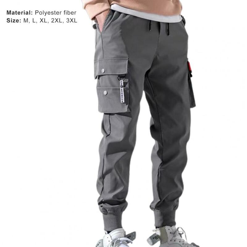 Pantalones Cargo con múltiples bolsillos para hombre, cintura elástica y cordón, Color sólido, delgados, pies de haz, guapo, 2024