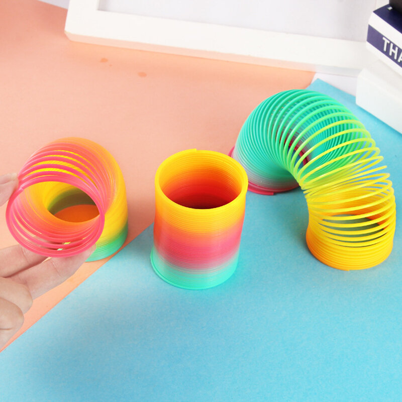 Rainbow Spring Coil Circle Toys Games magic Folding Plastic Funny Child regalo creativo educativo precoce per i bambini