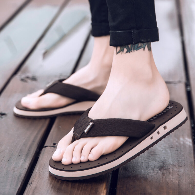 ฤดูร้อนขนาดใหญ่ชายหนุ่มรองเท้าแตะปลาโรมันนวดลื่นนอก Flip Flops Breathable หนา-soled รองเท้าแตะ