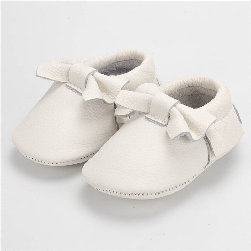 Svendita scarpe da bambino con fiocco in pelle Geunine scarpe da bambina per neonato primi camminatori mocassini per bambini 0-24 mesi