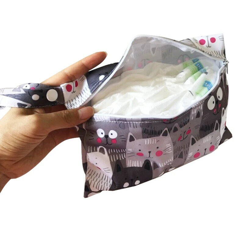 Waterptoof Mini กระเป๋าเปียก Reusable Nursing Pads ประจำเดือน PUL Snap Handle Wetbag Maternity กระเป๋าใส่ผ้าอ้อมเด็กรถเข็นเด็กกระเป๋า15*22.5ซม.