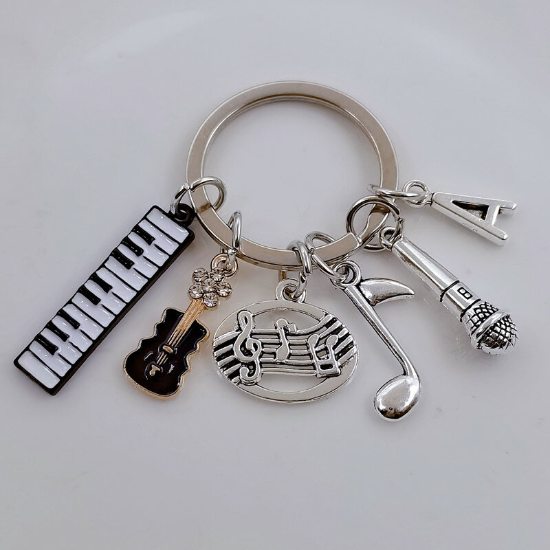 جديد الموضة A-Z رسالة ميكروفون البيانو المفاتيح الموسيقى المفاتيح المعادن ملاحظة الغيتار قلادة اليدوية والمجوهرات