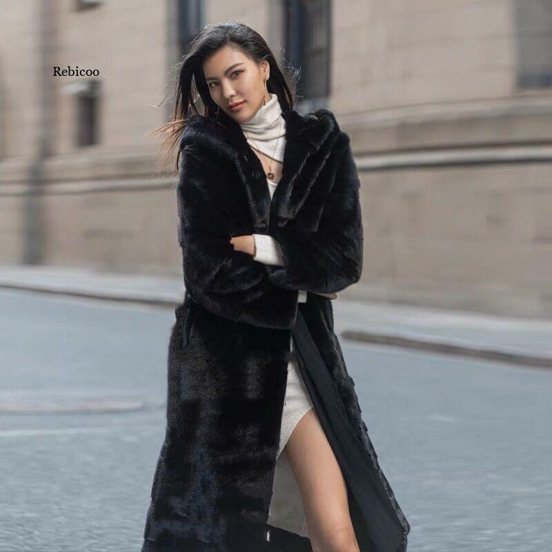 เกาหลียาว Faux Fur Hooded Coat ผู้หญิงฤดูหนาวแขนยาวผู้หญิงสีดำ Faux Mink Coat Outwear Plus ขนาดแฟชั่น