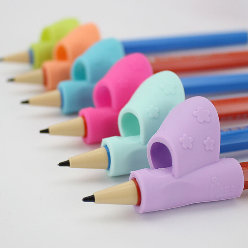Matite casuali a colori maniglia mano destra aiuta i bambini a imparare a tenere la penna e scrivere correzione della postura magia adatta a matita morbida