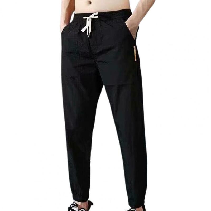 พลัสกางเกงขนาดผู้ชายสีทึบกระเป๋าสายรัดข้อเท้า Tie Cargo กางเกงกางเกงฤดูร้อนที่ร้อนแรงที่สุดน้ำหนักกางเกง
