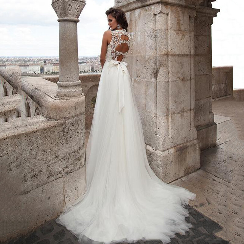 Wedding Dresses 2023 Sexy Spaghetti Backless Lace Appliques Bridal Gowns With Sheer Cape Bow Beach Wedding Gowns trouwjurk