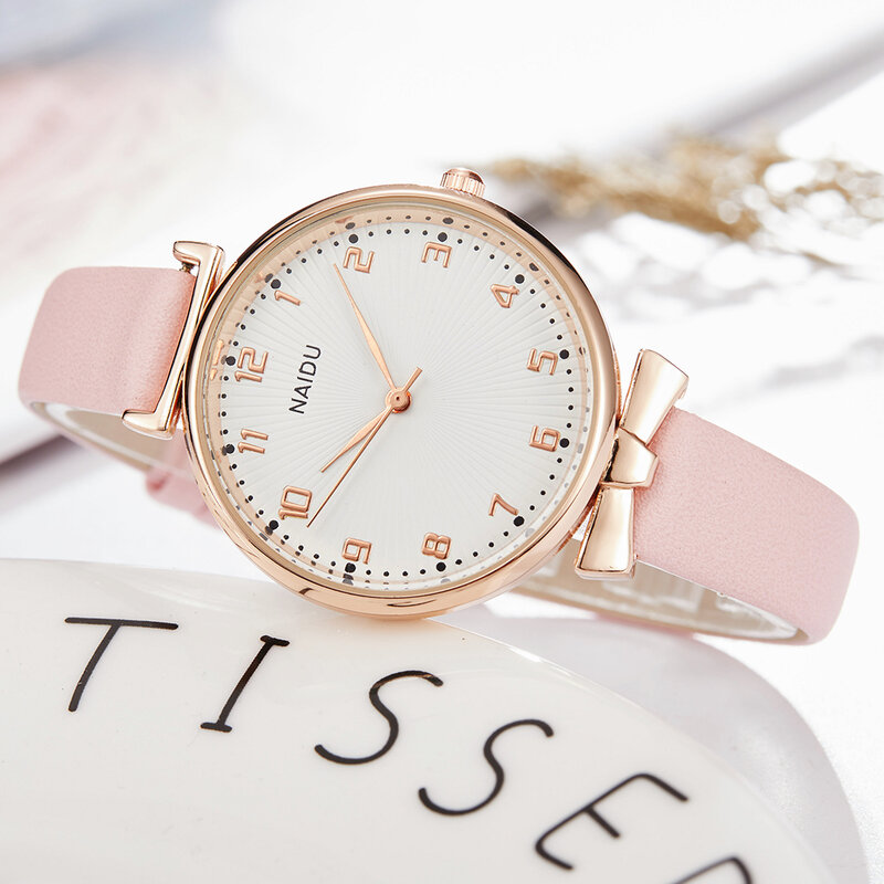 Reloj de cuarzo de moda para mujer, reloj de pulsera de oro rosa, correa de cuero, diseño de lazo, pulsera pequeña y ligera para mujer