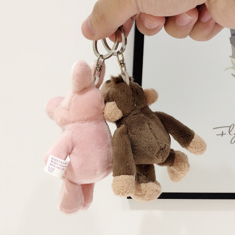 Porte-clés en peluche Animal Kawaii, pendentif sur sac à dos de téléphone, jouet pour sacs, chat, chien, ours, dinosaure, lapin, canard, raton laveur, renard