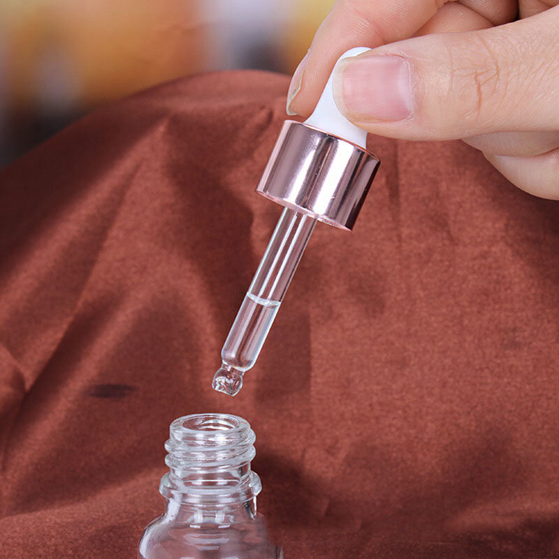 Tubi da 5-100ML liquido per aromaterapia in vetro contagocce trasparente per pipetta di olio essenziale per massaggi bottiglie riutilizzabili coperchio in oro rosa