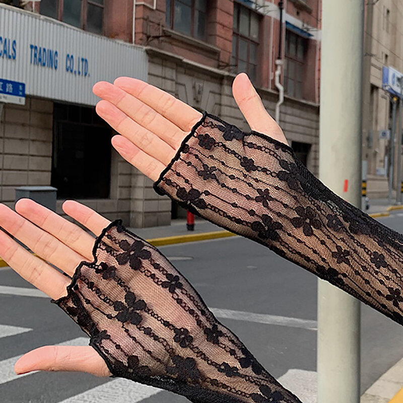 Nuovi guanti lunghi senza dita scavati in pizzo maniche di protezione solare guanti da ciclismo sottili in pizzo a rete