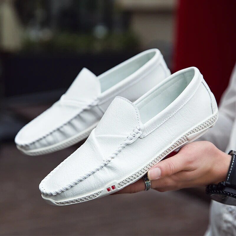 حذاء رجالي جلد فاخر مصمم 2021 عادية الانزلاق على الشقق بيني المتسكعون الرجال الأخفاف الأبيض الذكور أحذية قيادة Chaussure أوم