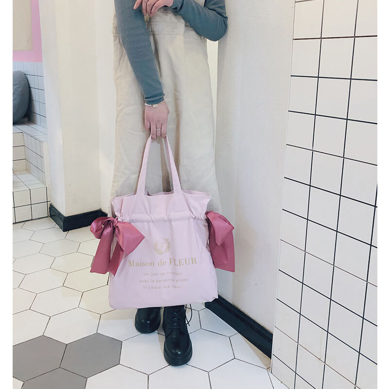 Płócienna torba na ramię damska koreańska wersja urocza kokardka dziewczęca torebka studencka moda duża pojemność torby szkolne wielokrotnego użytku zakupy