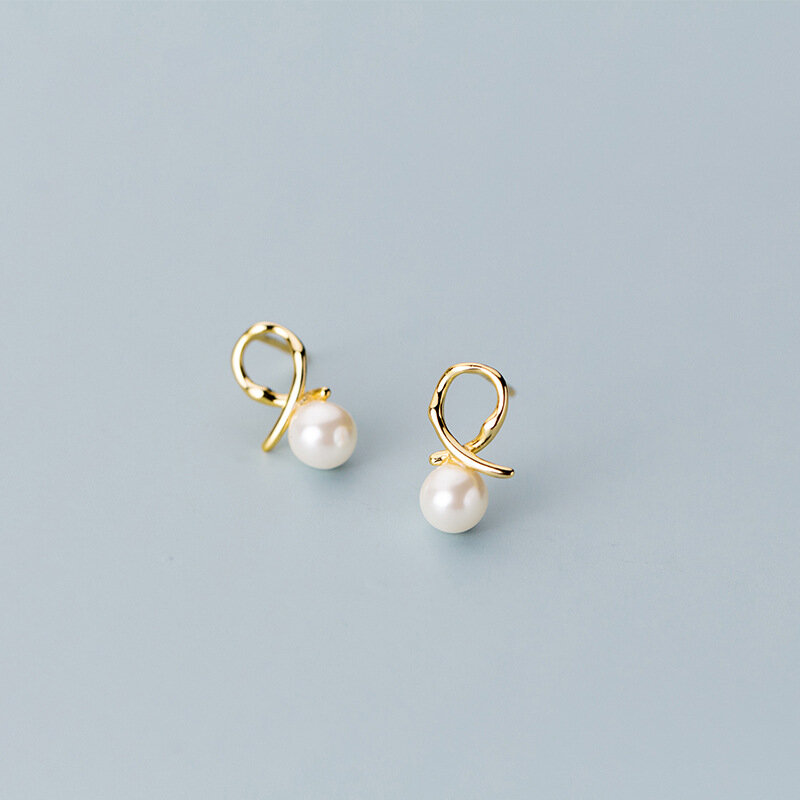 Boucles d'oreilles de luxe en perles croisées dorées pour femmes, bijoux de fête, fins, accessoires de mariée