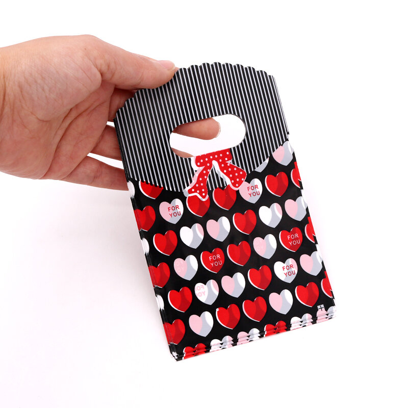 50 pz/lotto Multi design piccolo sacchetto di plastica 9x15cm sacchetto regalo Boutique con manici simpatici ciondoli orecchini sacchetti di imballaggio gioielli