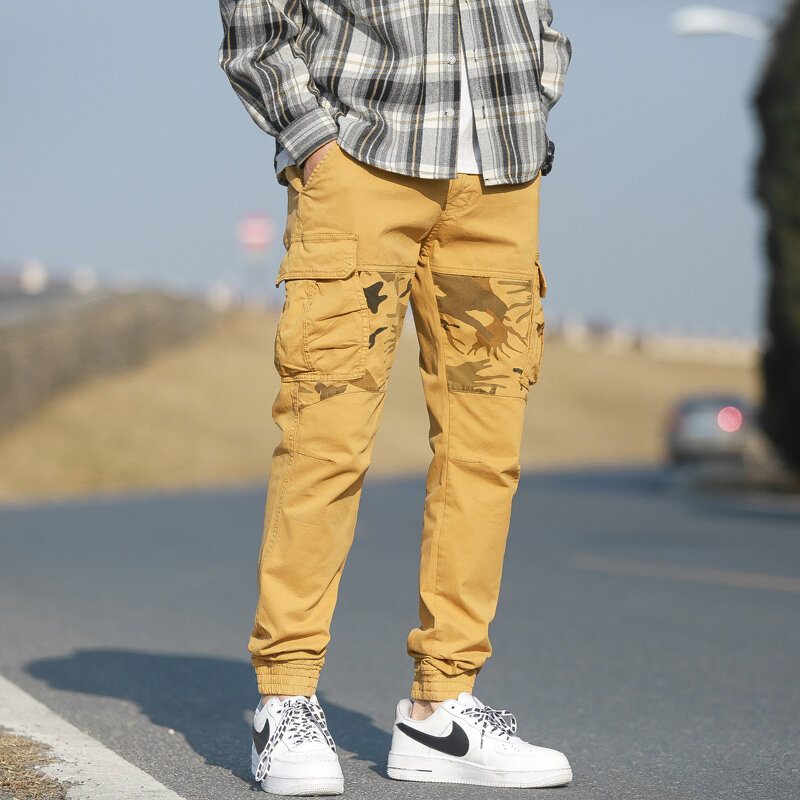 Moda kamuflażowe spodnie Cargo taktyczna wojskowa spodnie joggersy na co dzień mężczyźni multi-pocket hiphopowy sweter spodnie Pantalones