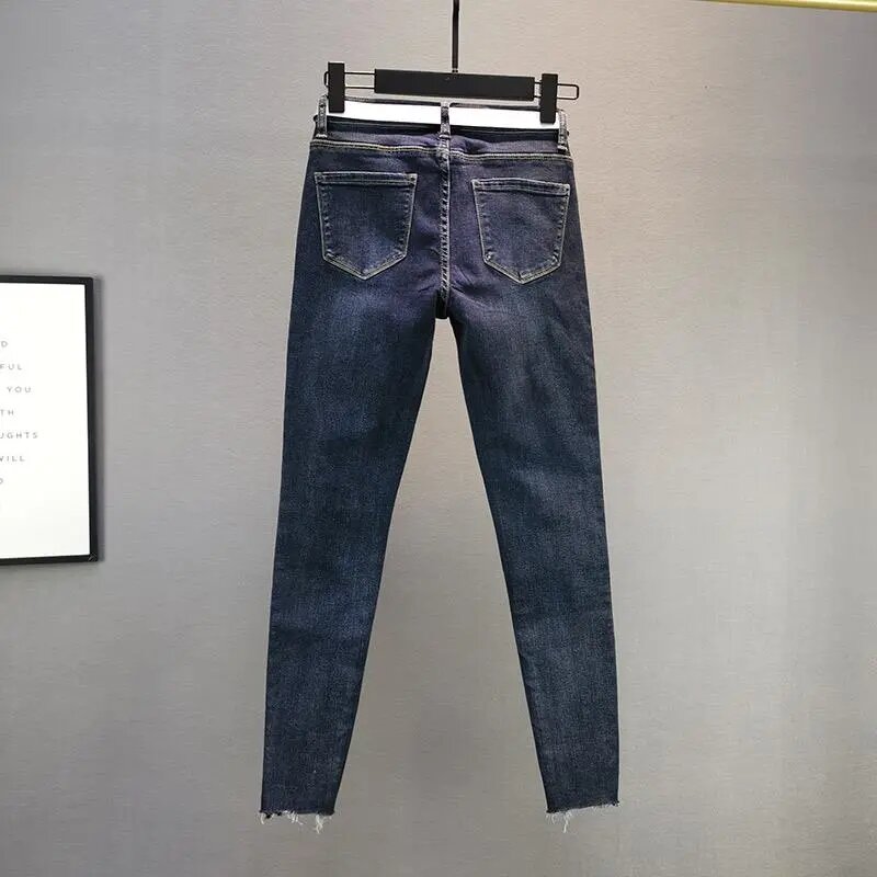 เอวสูงผีเสื้อเย็บปักถักร้อย Ripped กางเกงยีนส์ผู้หญิงดินสอสีฟ้า Denim กางเกงกางเกงกางเกงใหม่ Super Stretchy