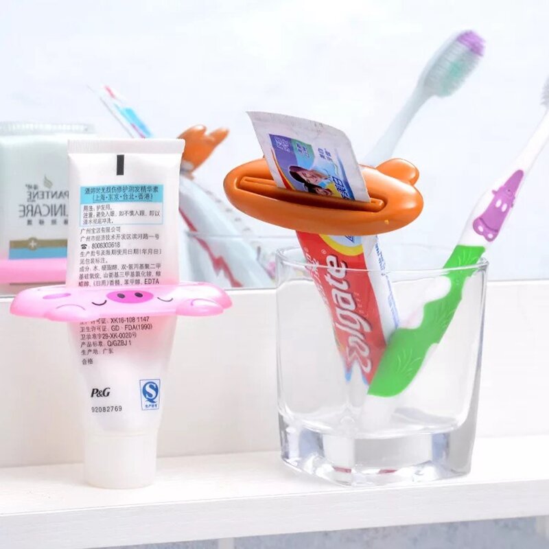 Cartoon dentifricio spremiagrumi Dispenser detergente viso clip Kid dentifricio Tube Saver dentifricio spremiagrumi accessori per il bagno