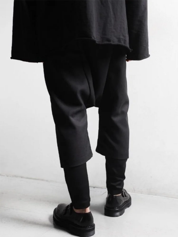 Celana Silang Pria Celana Selangkangan Gantung Musim Semi dan Musim Gugur Baru Penyambungan Layering Palsu Dua Desain Celana Santai Gelap