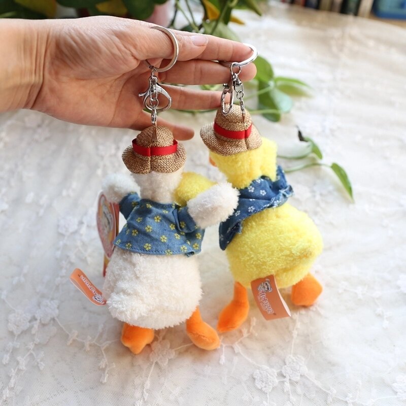 Bonito pato de pelúcia chaveiros brinquedos kawaii feminino bolsas titular da chave do carro saco pingentes decoração acessório chaveiro para presentes das meninas