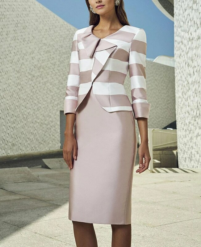pink mikado with a tubed cut to the knee with V neckline dress Two-tone white pink striped jacket with original ruffle closure.
