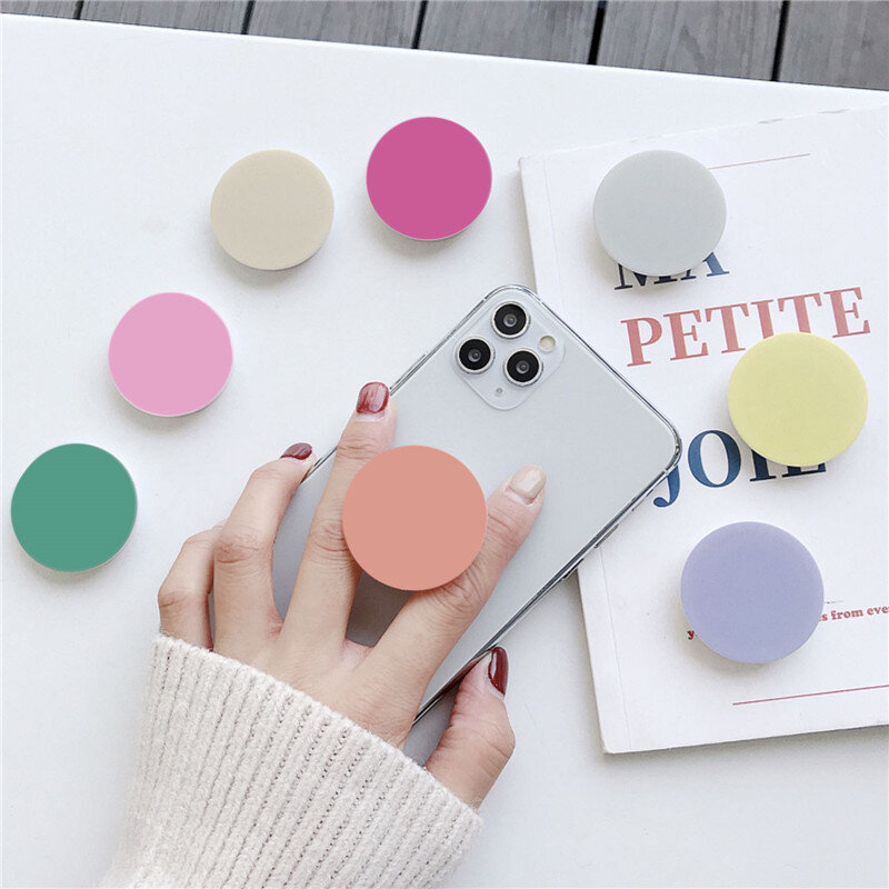 Universal fresh solid color cute round foldable mobile phone handle bracket mobile phone ring bracket suitable for iPhone