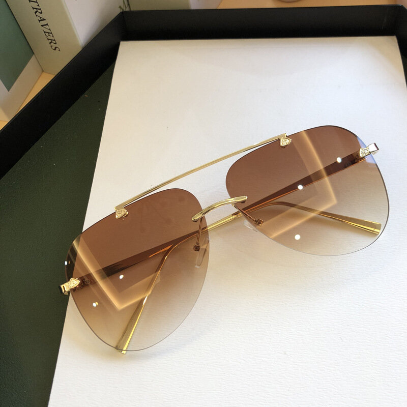 Lunettes de soleil ovales sans monture pour hommes et femmes, lunettes de soleil d'été, créateur de luxe, mode, UV400
