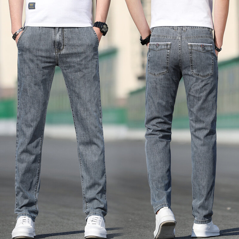 2023 estate nuovi Jeans grigi elasticizzati larghi da uomo moda Casual Stretch pantaloni in Denim a gamba dritta maschile marca azzurro