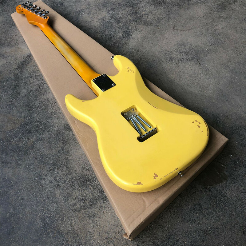 Guitarra Eléctrica reliquia, guitarra reliquia ligera, amarillo crema, tablero protector verde, tono de cola, almohada de cuerda de hueso ox, venta al por mayor