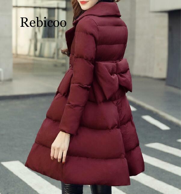 冬の女性の甘いジャケット A ラインダウン綿ビッグ弓女性綿が詰めスリム冬コート