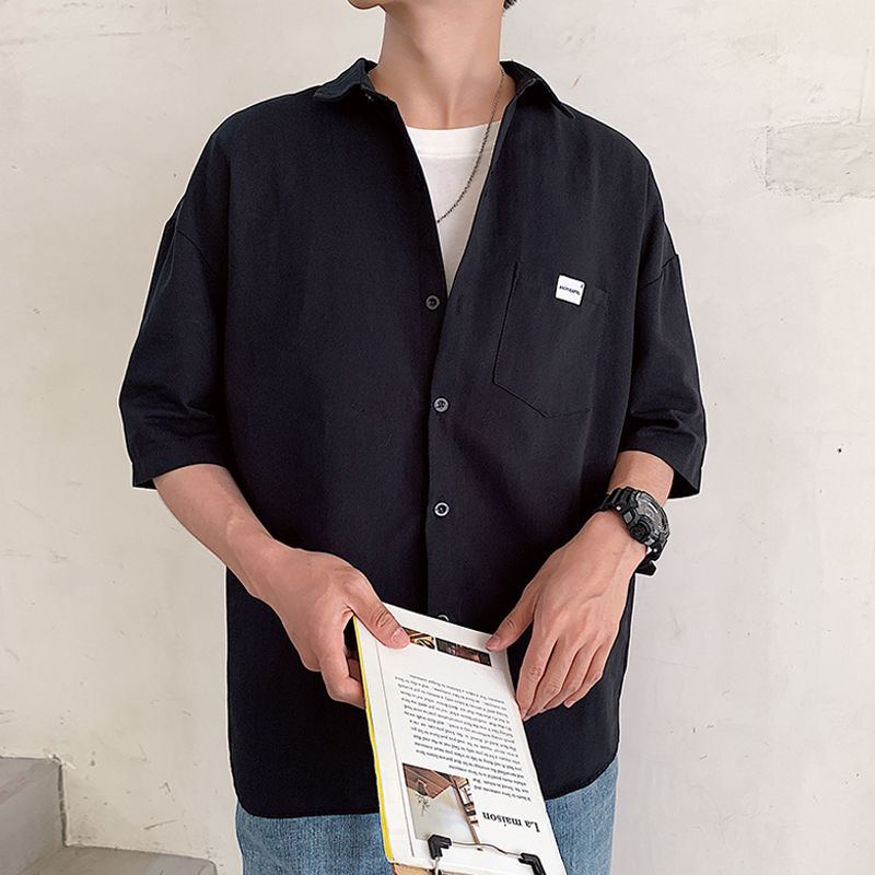 Camisa de manga curta masculina nova tendência solta estudantes coreanos cor pura selvagem chique meia manga