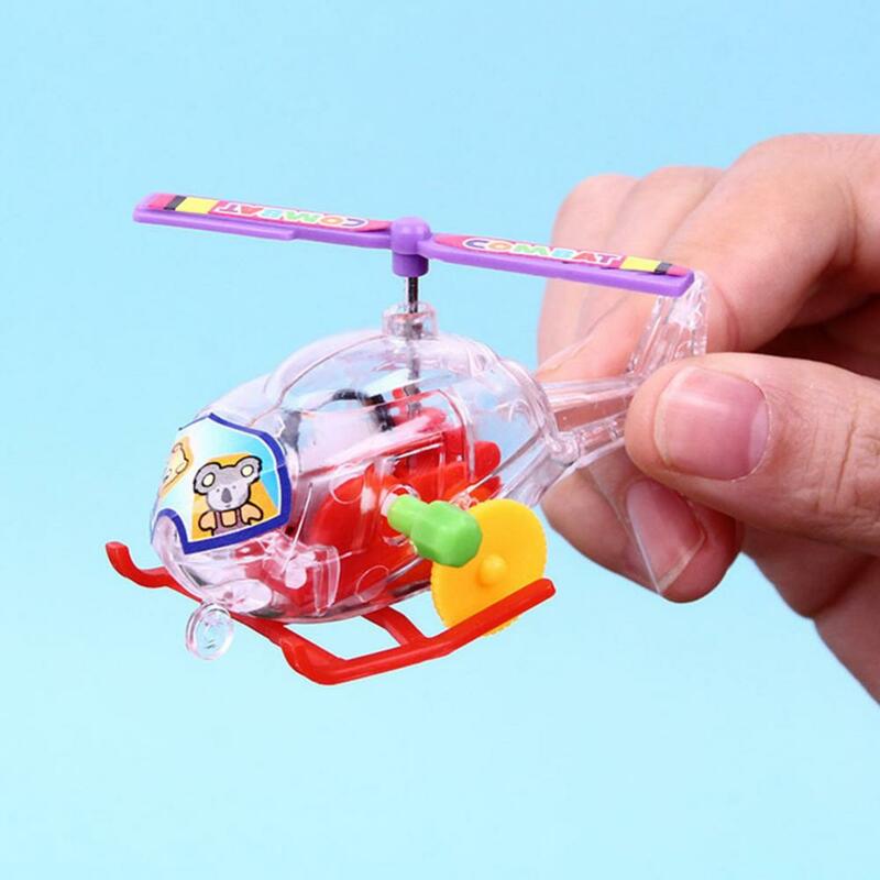 1 pçs corda acima brinquedos transparente mini aeronaves relógio corda acima brinquedos crianças avião modelo de brinquedo para crianças presentes de aniversário do bebê