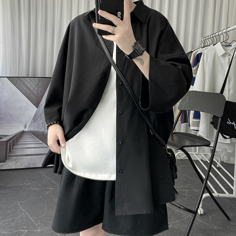 Koreańska szeroka koszula moda męska lato czarna biała koszula z krótkim rękawem mężczyźni Streetwear luźne społeczeństwo koszula męska sukienka M-2XL
