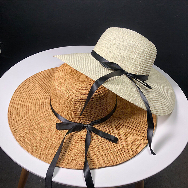 新製品わら帽子奥様レジャー旅に行く弓わら帽子屋外休暇に日焼けは庇太陽帽子