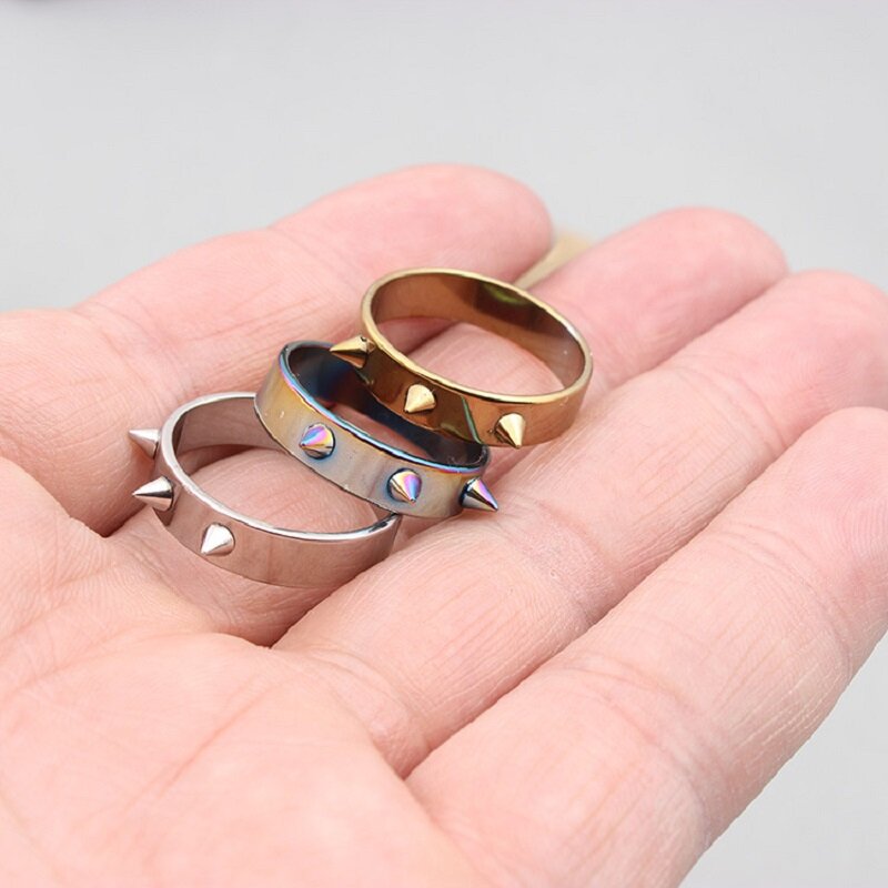 2 uds anillo de defensa Personal arma de titanio acero hombres mujeres anillos para nudillos para defensa Personal-Color aleatorio