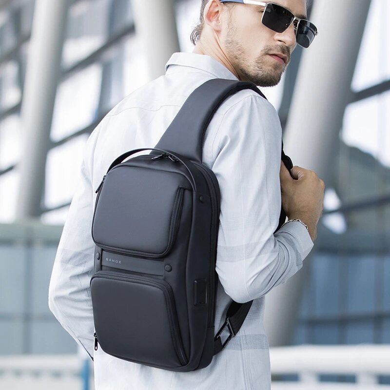 BANGE العلامة التجارية الجديدة ترقية بولي TPU سعة كبيرة متعددة الوظائف Crossbody حقيبة رجالية USB حقيبة كتف مقاوم للماء السفر حقيبة صدر للرجال