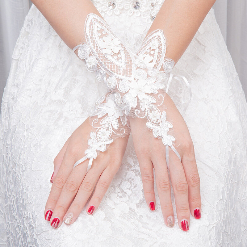 New Arrival Ivory rękawiczki ślubne koronkowe aplikacje zroszony tanie koronkowe rękawiczki Sexy akcesoria ślubne ślub długi tiul rękawiczki damskie